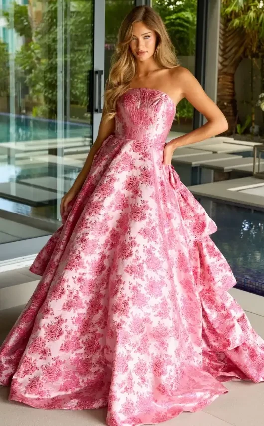 Model wearing a gown by Ava Presley