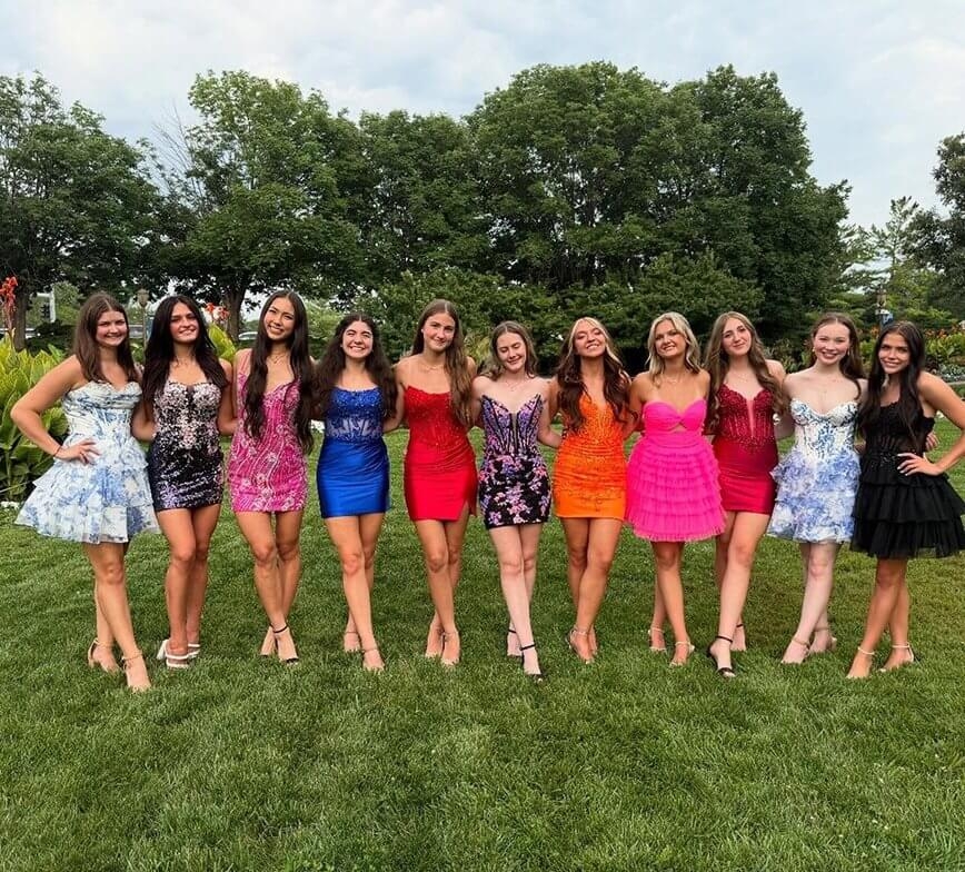 Models wearing a color dresses