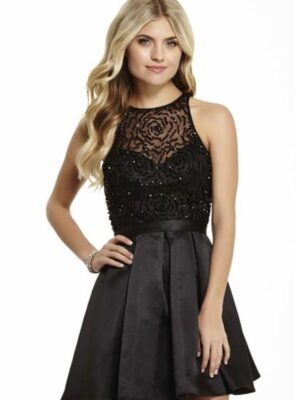 Model wears black lacy dress