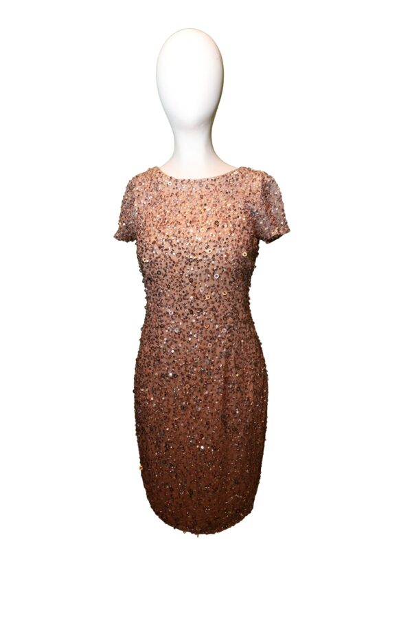 gold sequined dress on mannequin