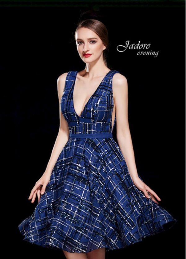 Model wears navy sequined dress