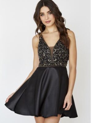 Model wears black beaded dress