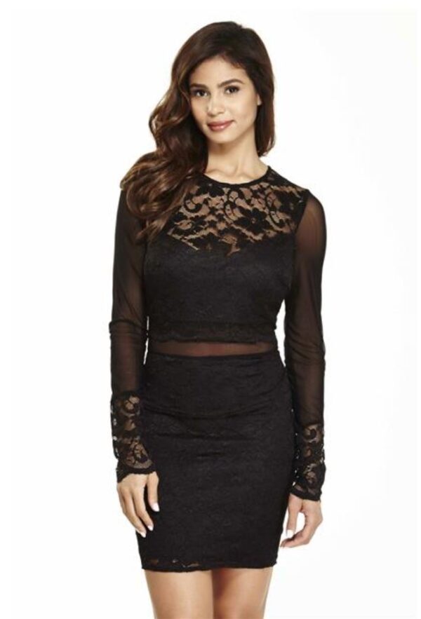 Model wears lacy black dress with long sleeves