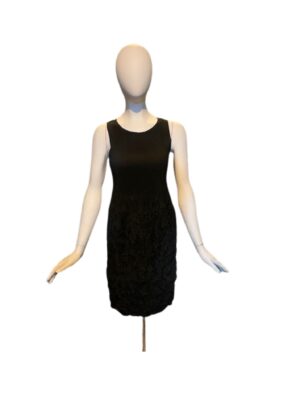 Sleeveless black dress on mannequin