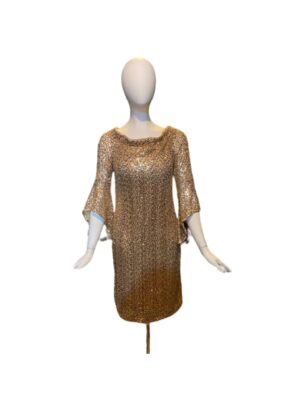 long sleeve gold dress on mannequin