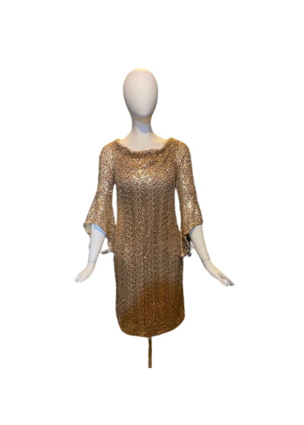 long sleeve gold dress on mannequin