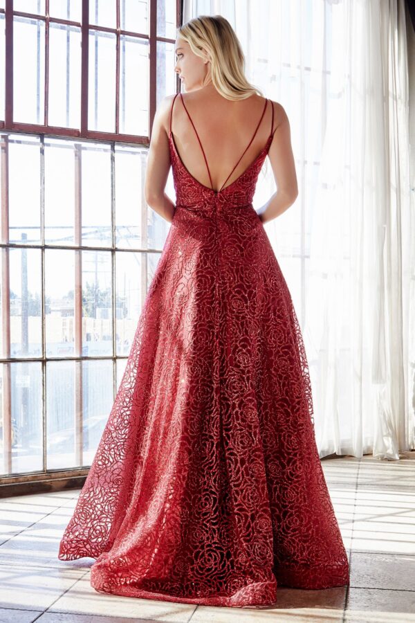 model shows back of red ballgown