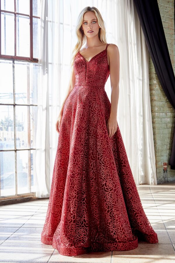 Model wears red glitter ballgown
