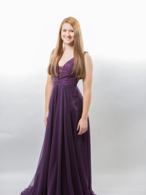 model shows eggplant chiffon dress
