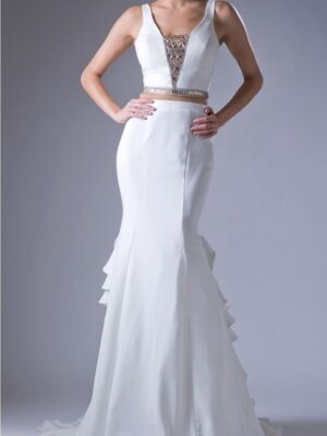 Model wears two-piece ivory gown