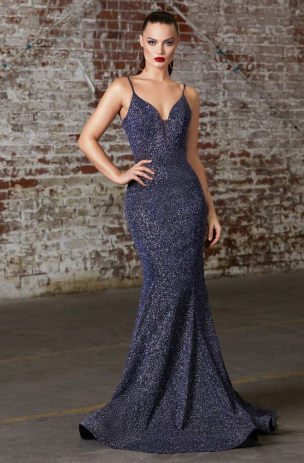 model wears blue glitter gown