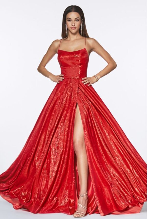Model wears red gown with leg slit