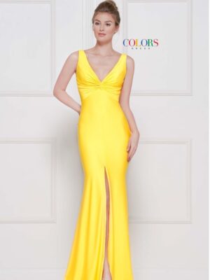 Model wears yellow dress with front slit