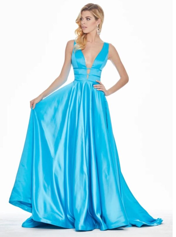 model wears turquoise ballgown