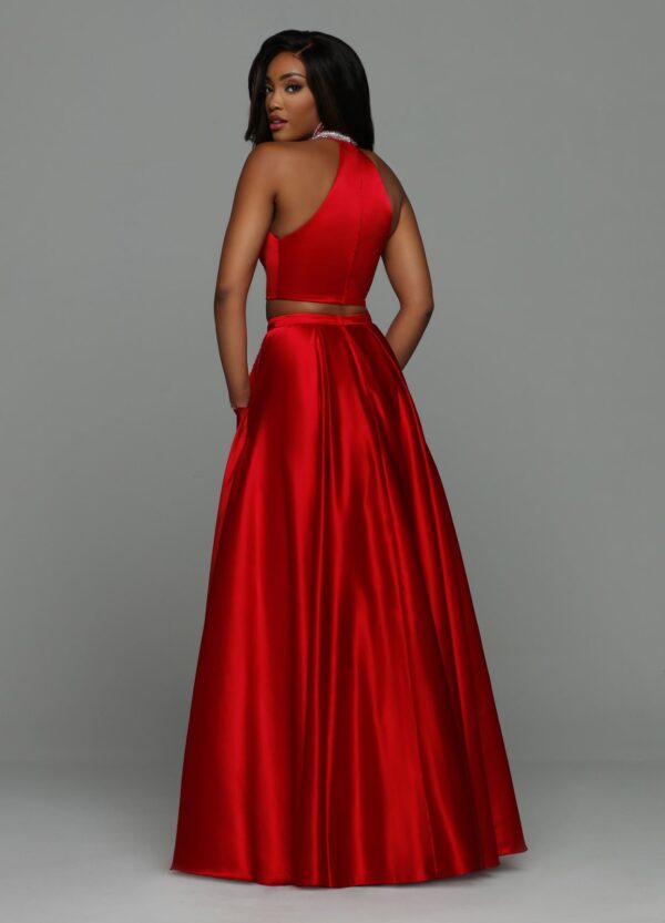 model shows back of red dress