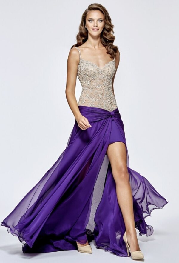 Model wears gold and purple gown