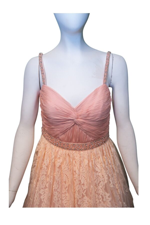 Closeup of peach lacy dress