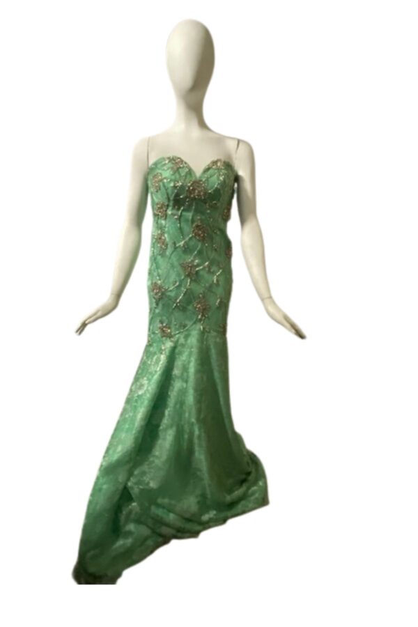 Green strapless dress on mannequin