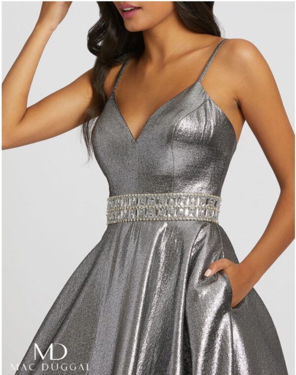 model shows closeup of silver dress