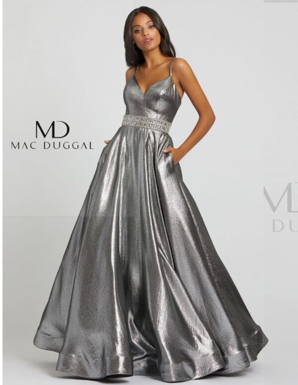Model wears silver gown