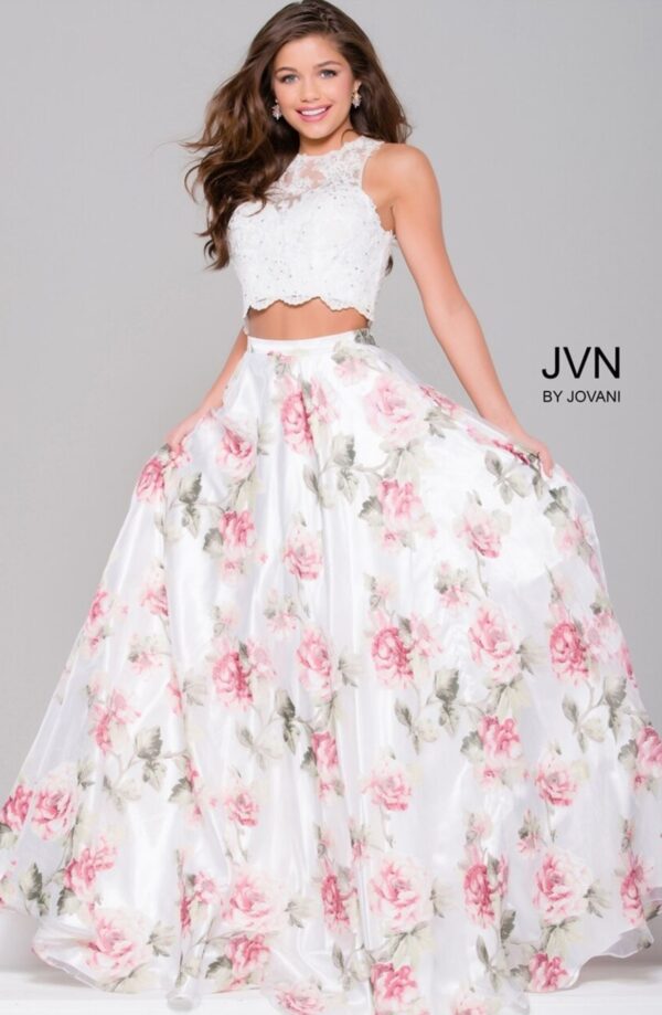 model wears white top and full floral skirt