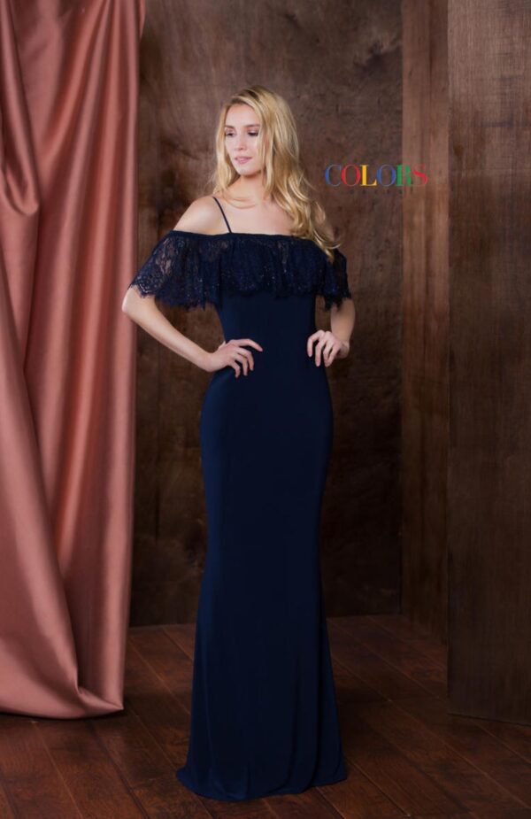 Model wears lacy navy gown