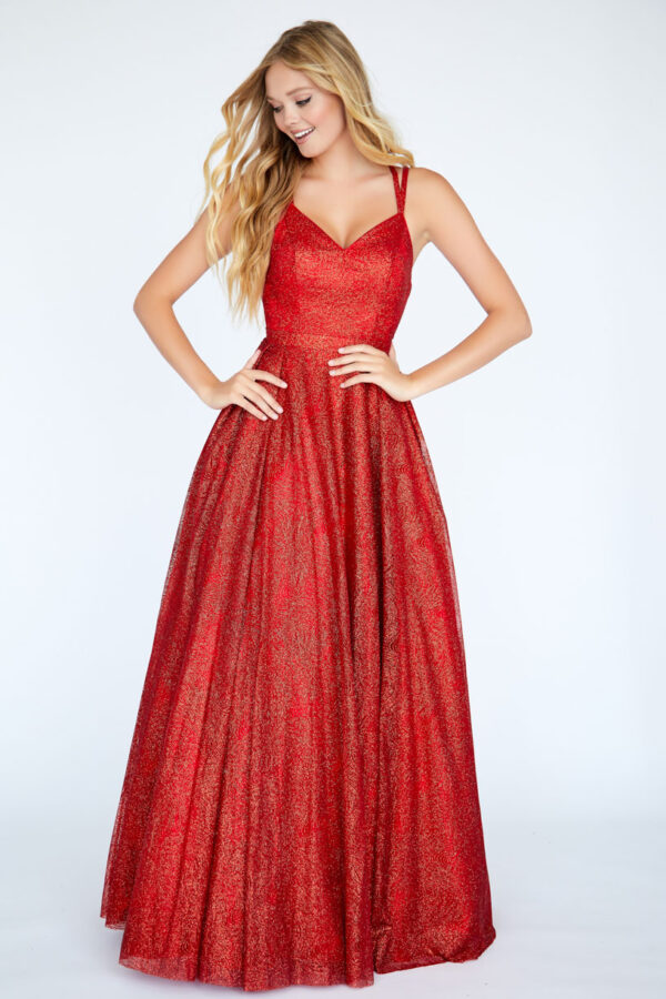 model wears red ballgown
