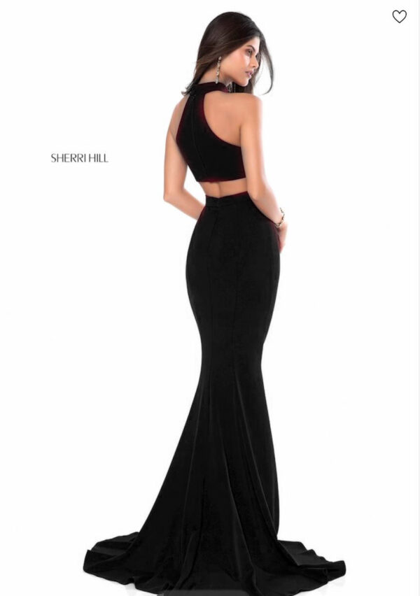 back of black dress on model
