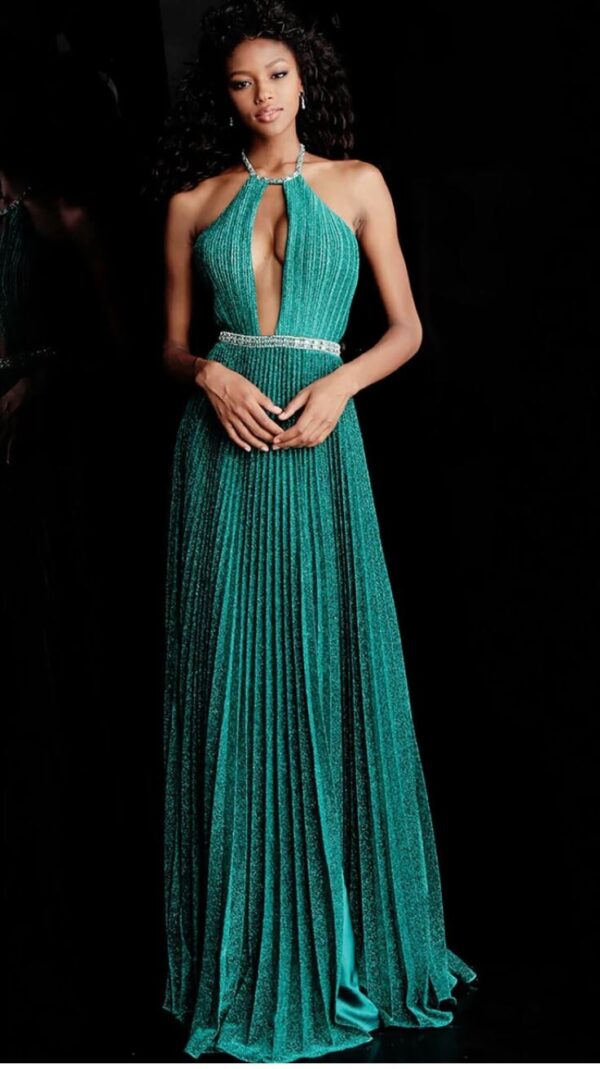 model wears emerald pleated gown