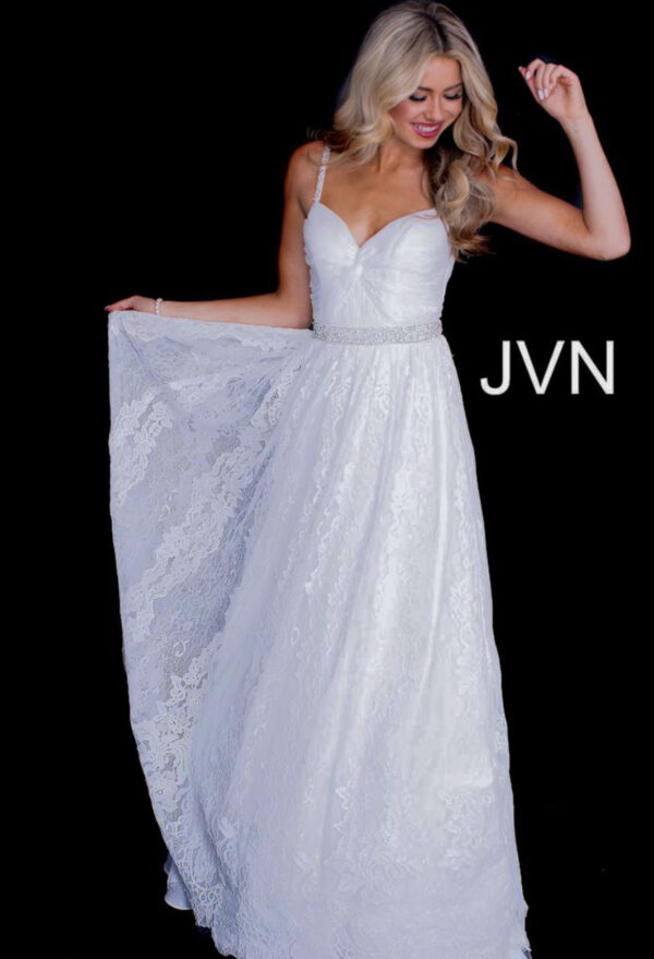 model wears white lace dress