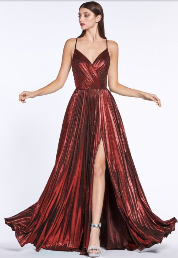 model wears burgundy metallic dress with pleats