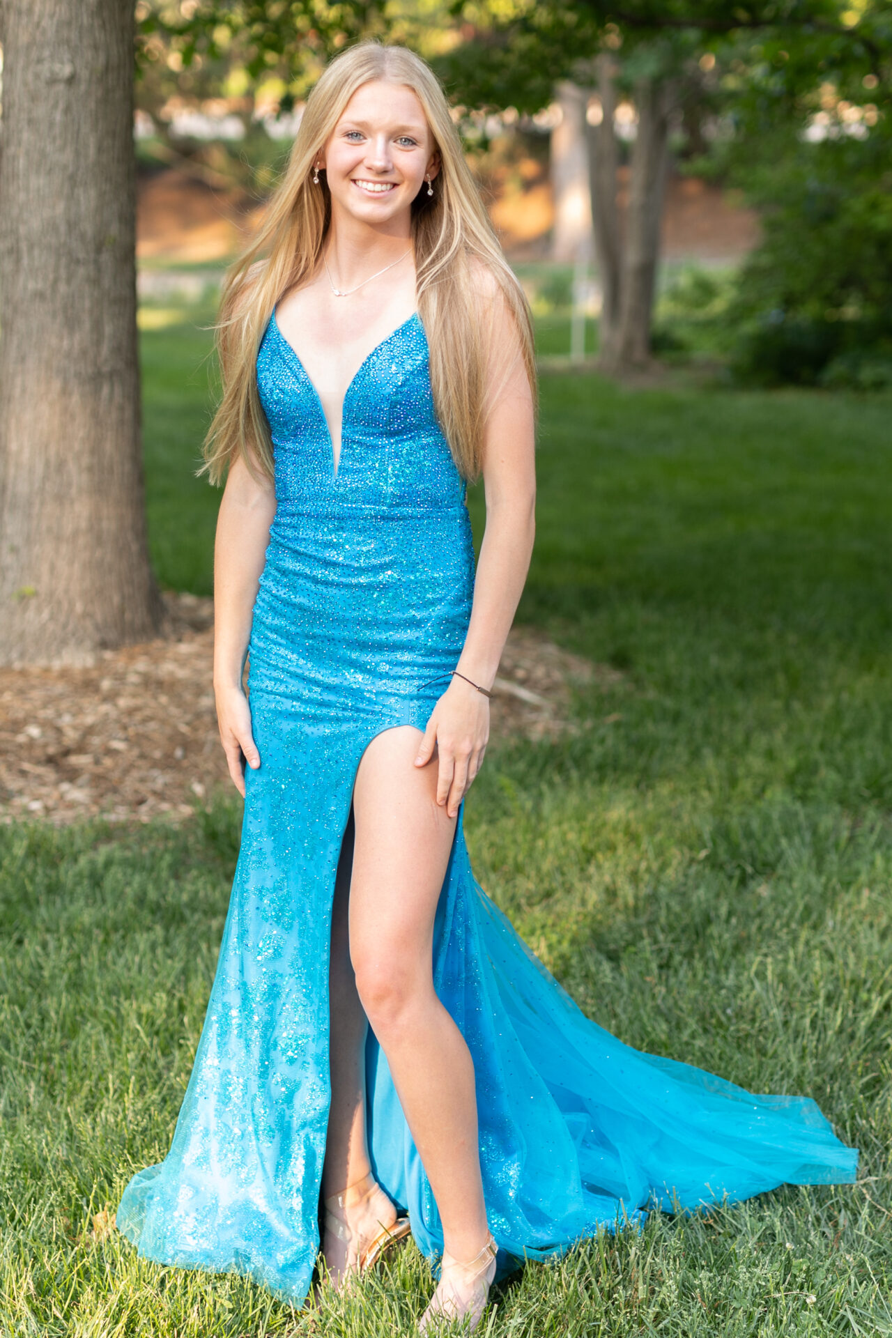 Blonde girl in long blue dress